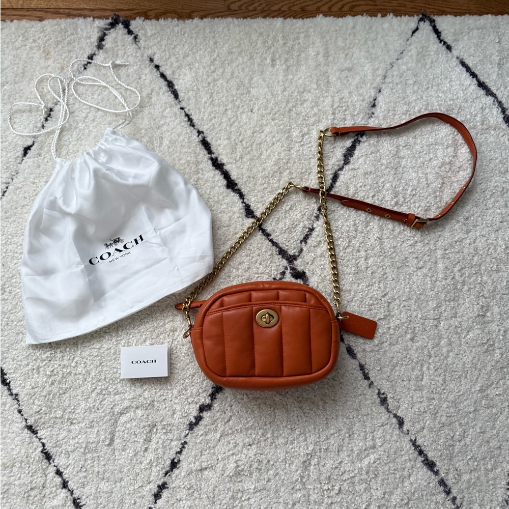 Women’s Coach leather small camera crossbody purse bag